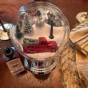 Festive Snow Globe with Red Truck Bath & Body plug in. New